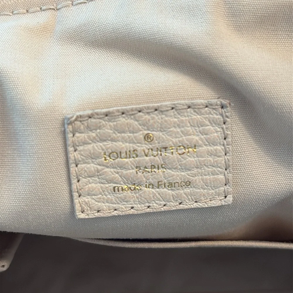 Louis Vuitton magnificent 100%